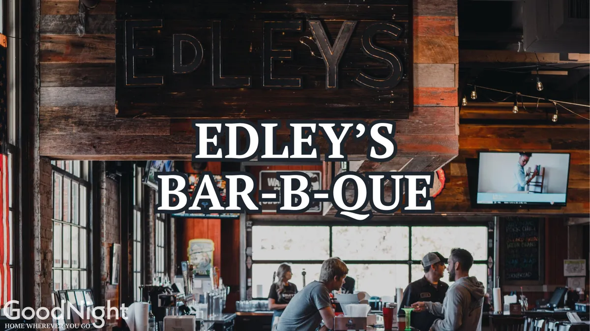 The inviting interior of a popular BBQ restaurant, with its prominent 'EDLEY'S BAR-B-QUE' sign, bustling bar area, and guests enjoying their meals. The atmosphere is friendly, communal, and distinctly local, echoing Nashville’s celebrated food scene.